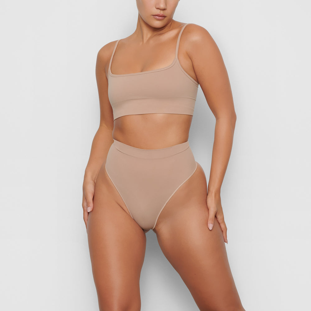 Skims SCULPTING MID WAIST Thong Clay | SELN87016