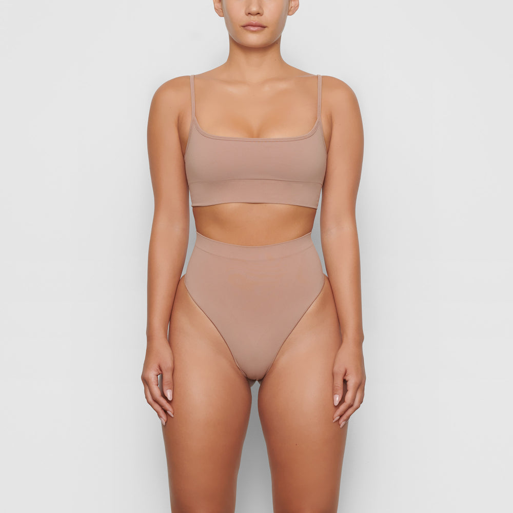 Skims SCULPTING MID WAIST Thong Sienna | YNCW39062